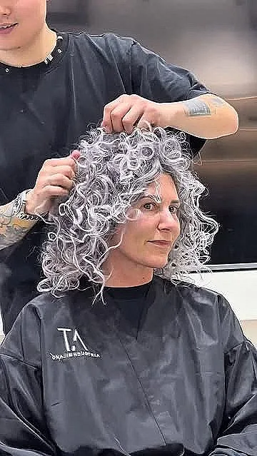 Textured Silver Curly Hairstyle
