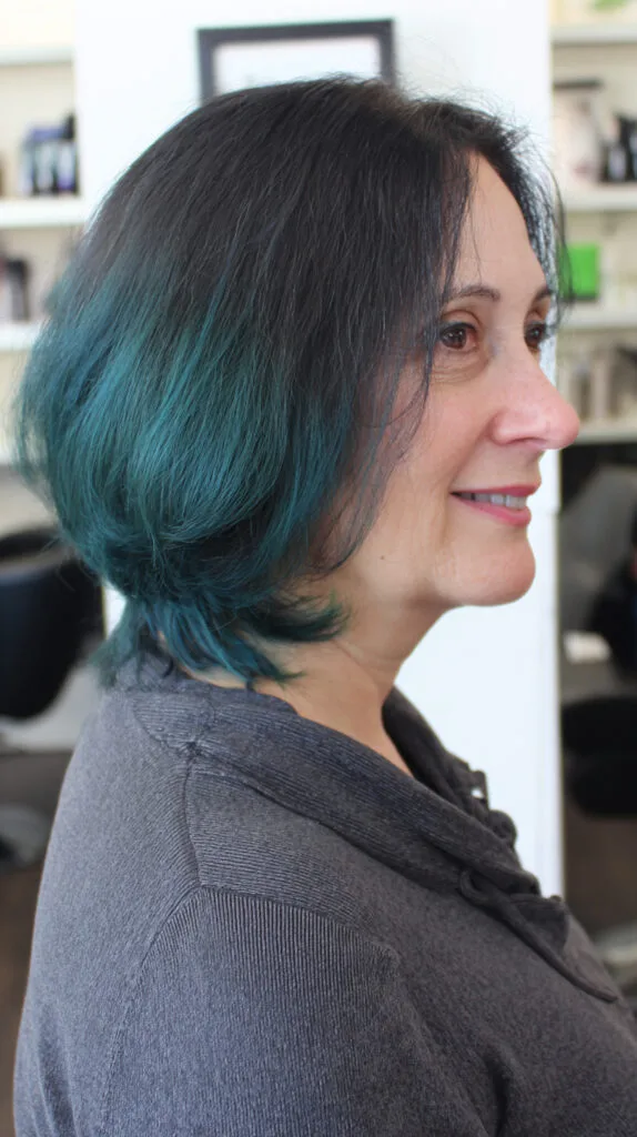 Bold Teal-Infused Layered Bob
