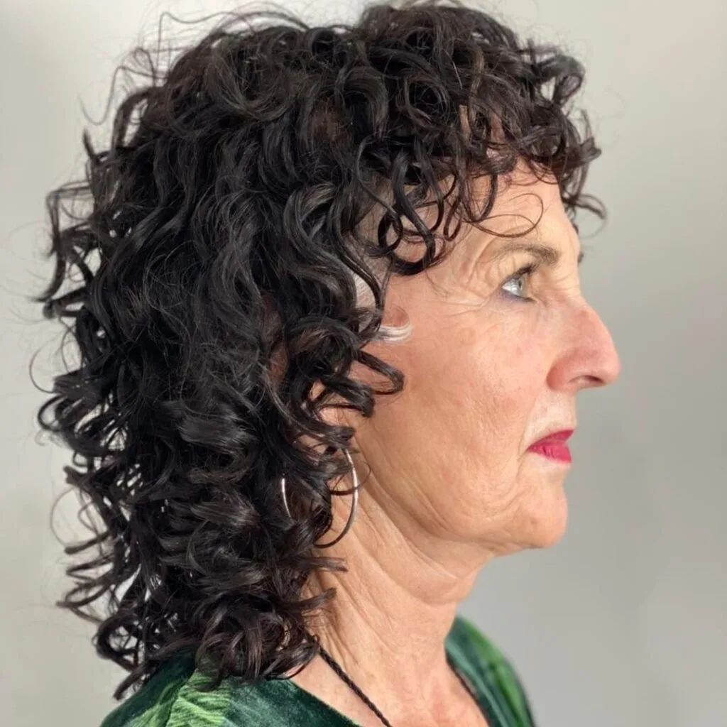 Charming Shoulder-Length Curly Cut with Defined Layers