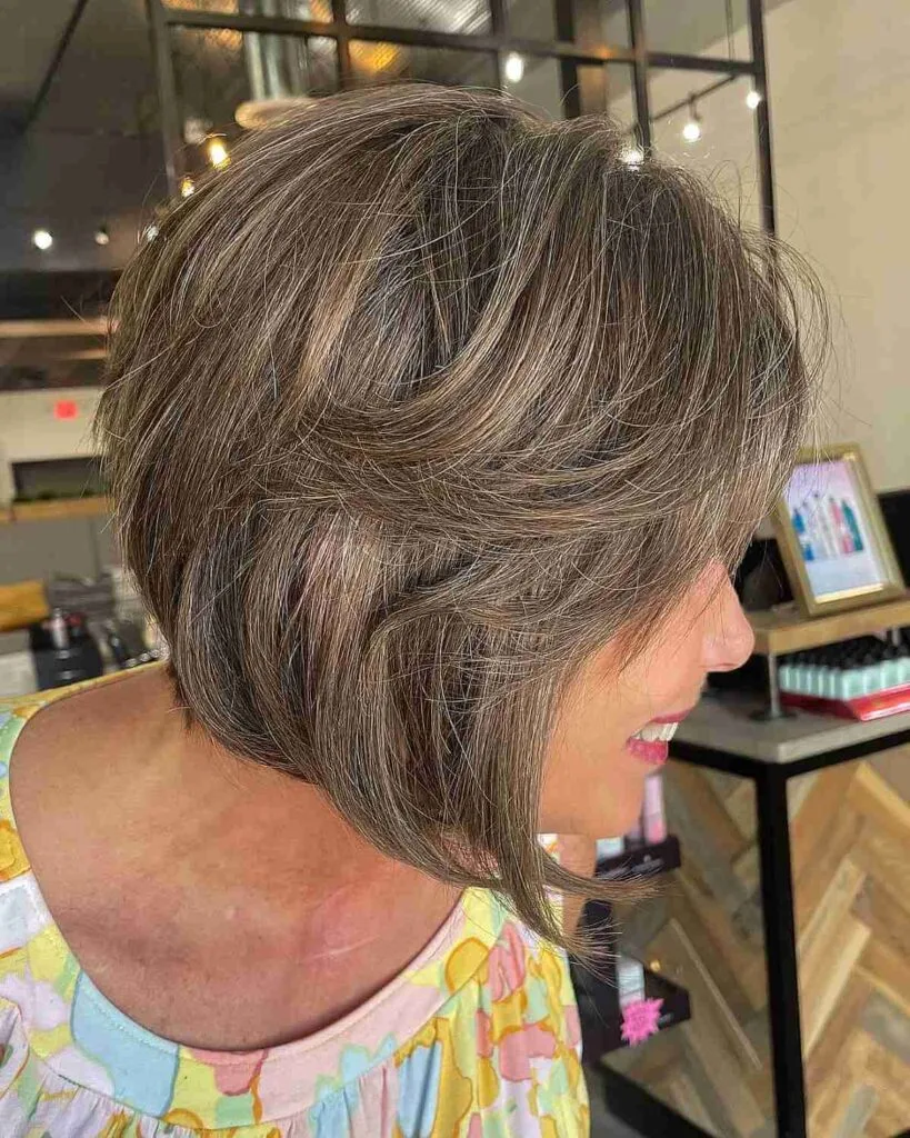 Chic Inverted Bob with Soft Feathery Layers for an Older Lady