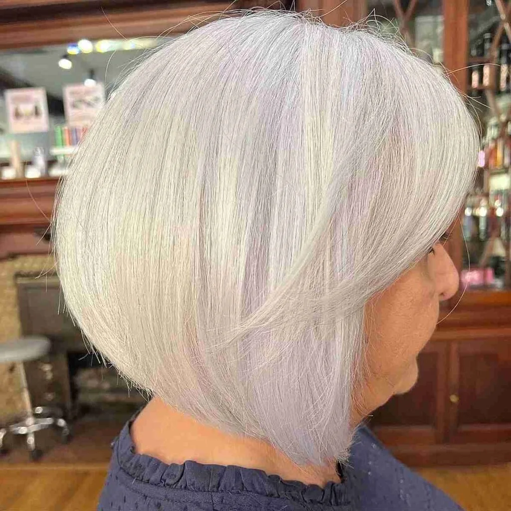 Chic Short Round Haircut in Platinum Blonde Shade for Older Women
