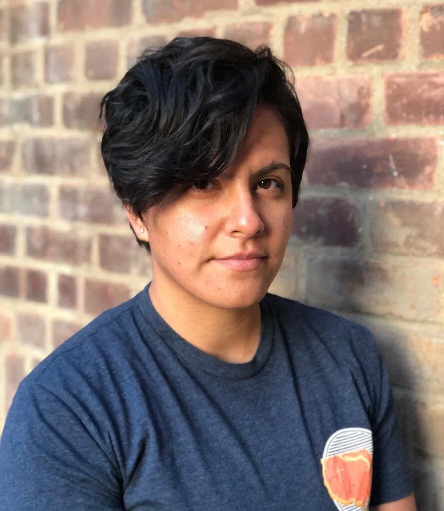 Dynamic Textured Pixie Cut with Asymmetrical Layers