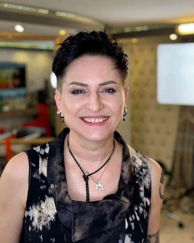 Elegant Black Pixie with Buzzed Sides for Ladies 40 and Over
