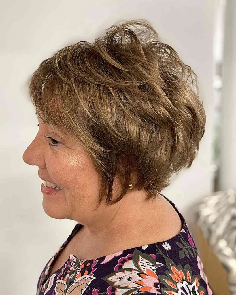 Elegant Brunette Long Pixie Cut for Ladies Aged 40