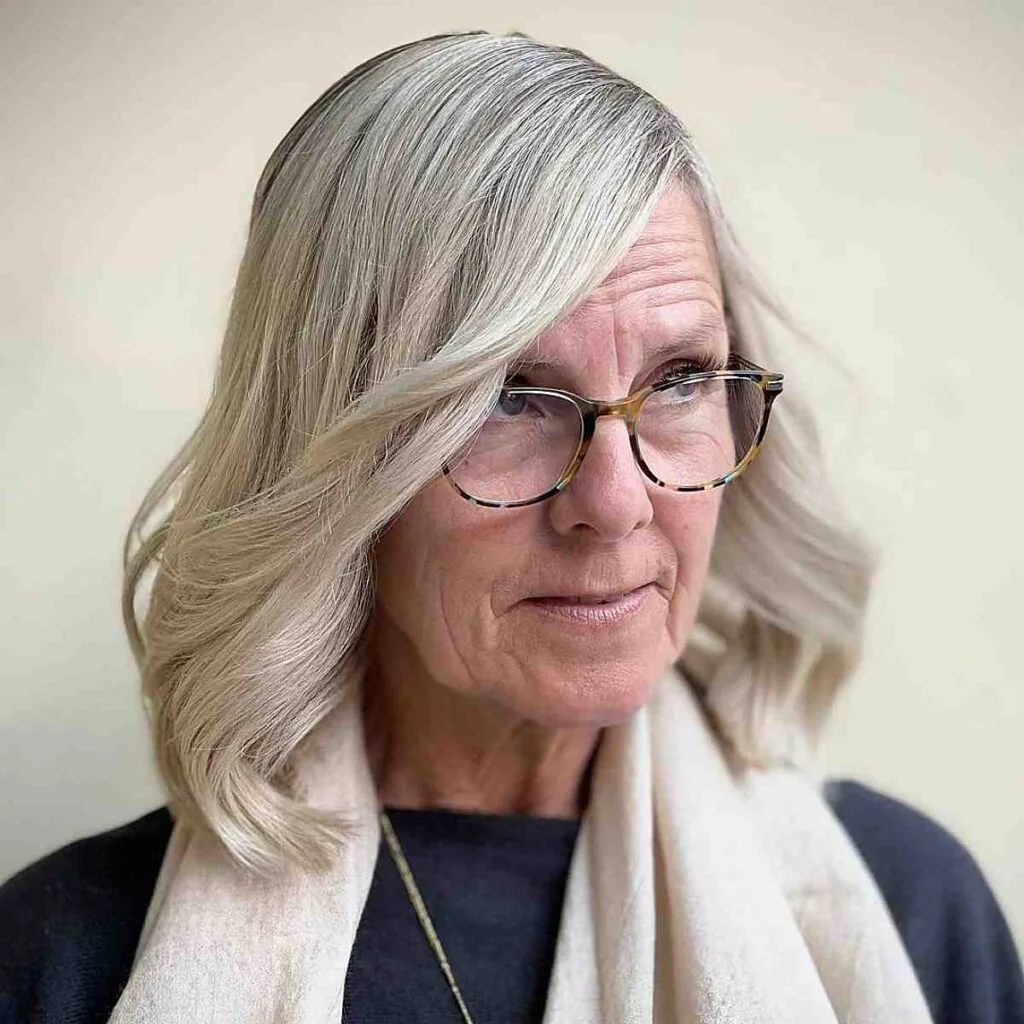 Elegant Long Bob for 70-Year-Old Women with Glasses
