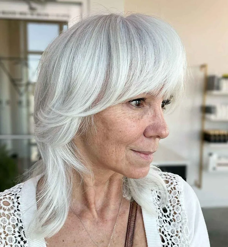 Elegant Shag with Bold Bangs for Silver Hair