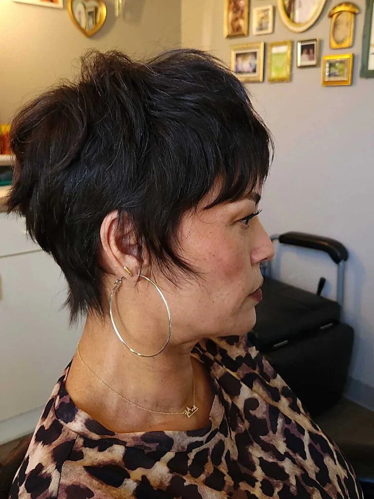 Jet black layered bixie with volume and hoop earrings