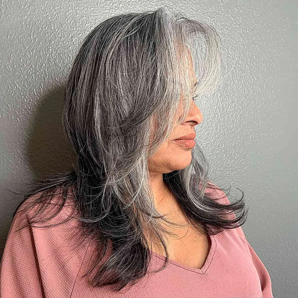 Medium-Length Butterfly Layers with Two Tone Grey Hair for Older Ladies