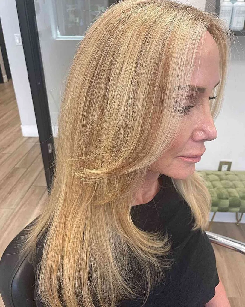 Mid-Length Feathered Cut with Butterfly Face-Frame for Women of Any Age