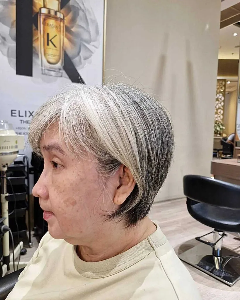 Natural gray and white bixie with wispy ends and side part