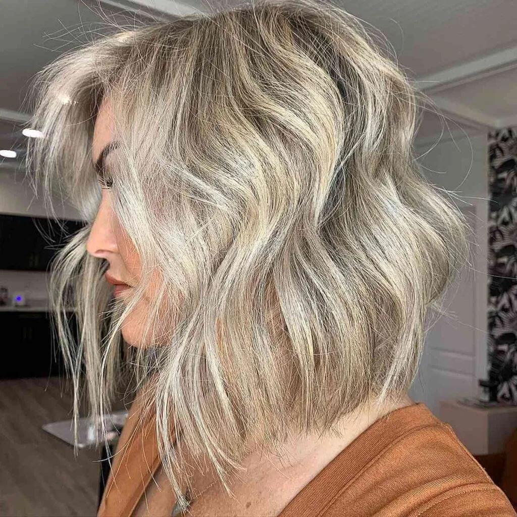 stylish medium length wavy bob for a 50 year old woman