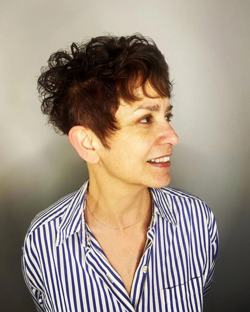 Textured Curly Pixie Cut with Bold Volume