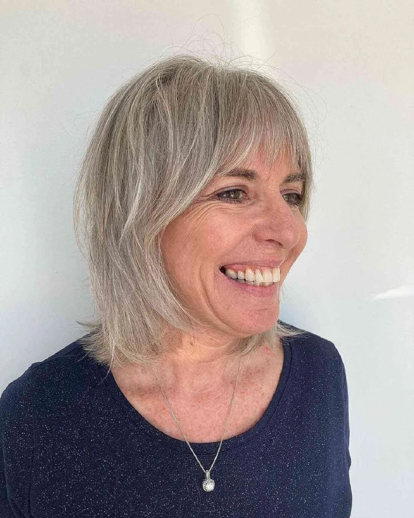 Textured Shag with Curtain Bangs for Sleek Hair
