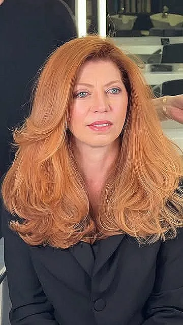Vibrant Long Red Hair with Layered Volume