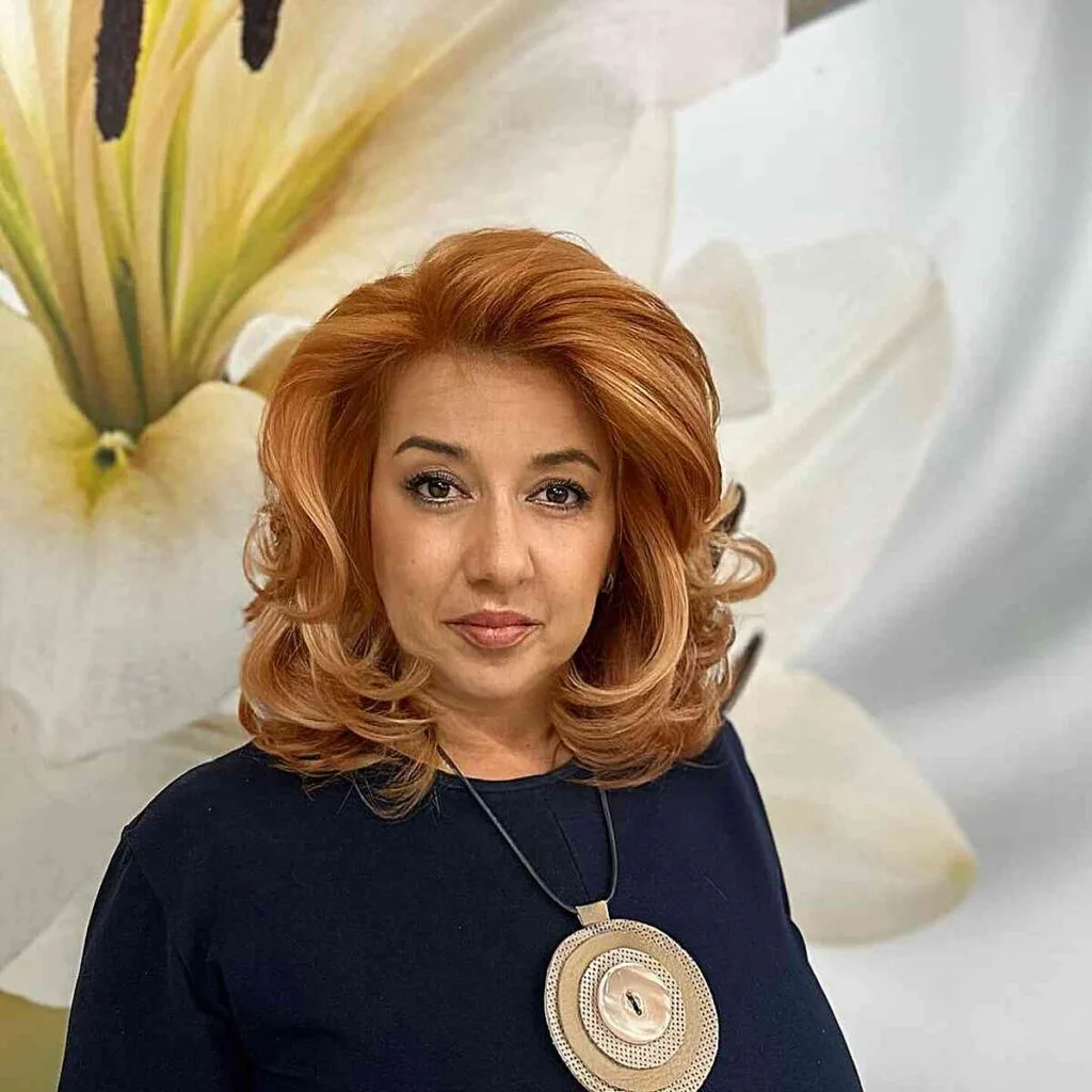Voluminous Copper Mid-Length Cut for 50-Year-Olds with Thick Hair