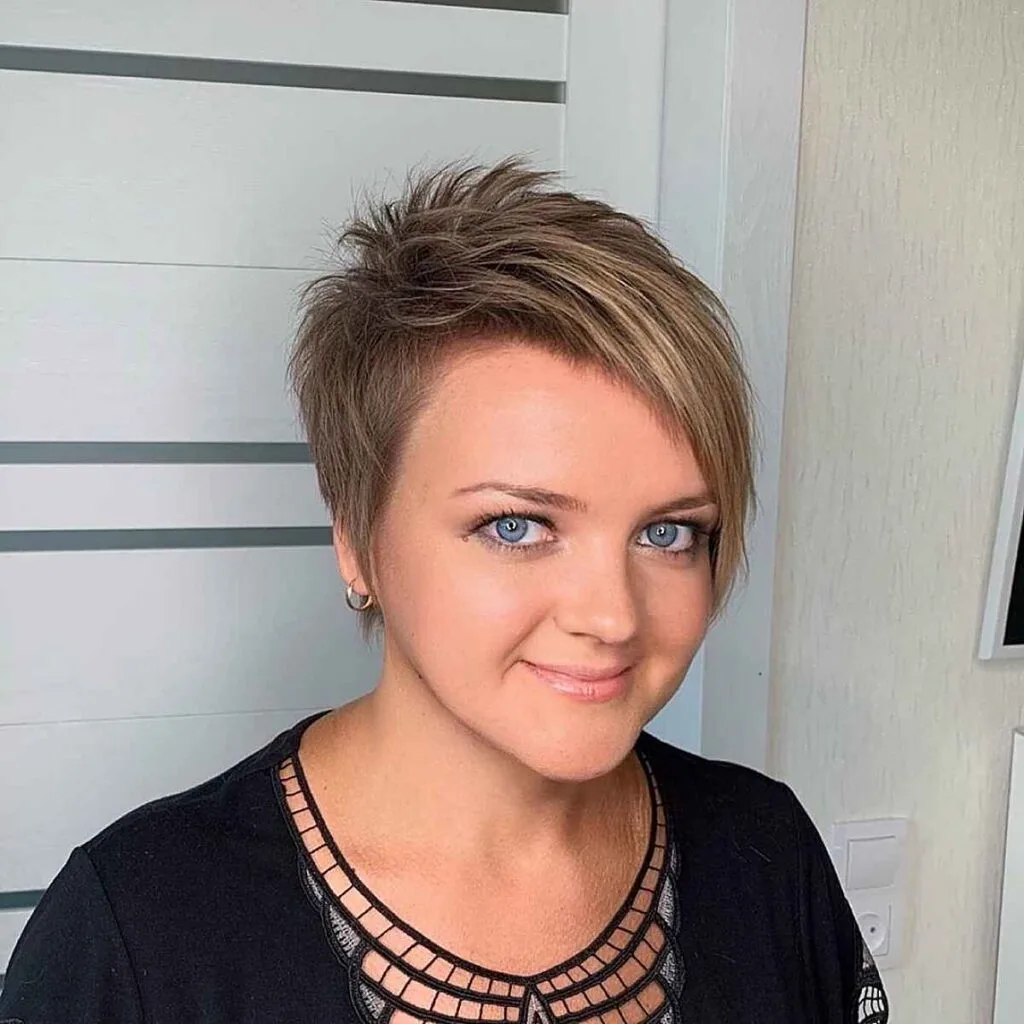 Chic asymmetrical pixie hairstyle featuring eyeglasses on mature women