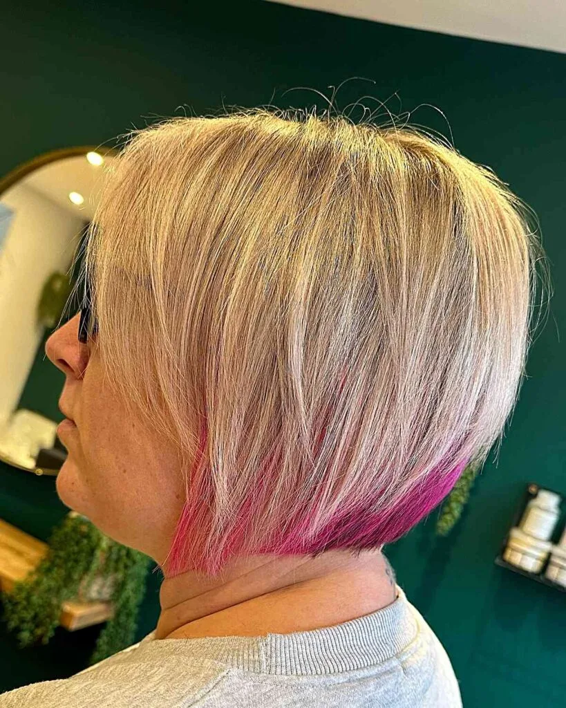 Chic Blonde Short Bob with Subtle Pink Highlights for Overweight Women Over 50
