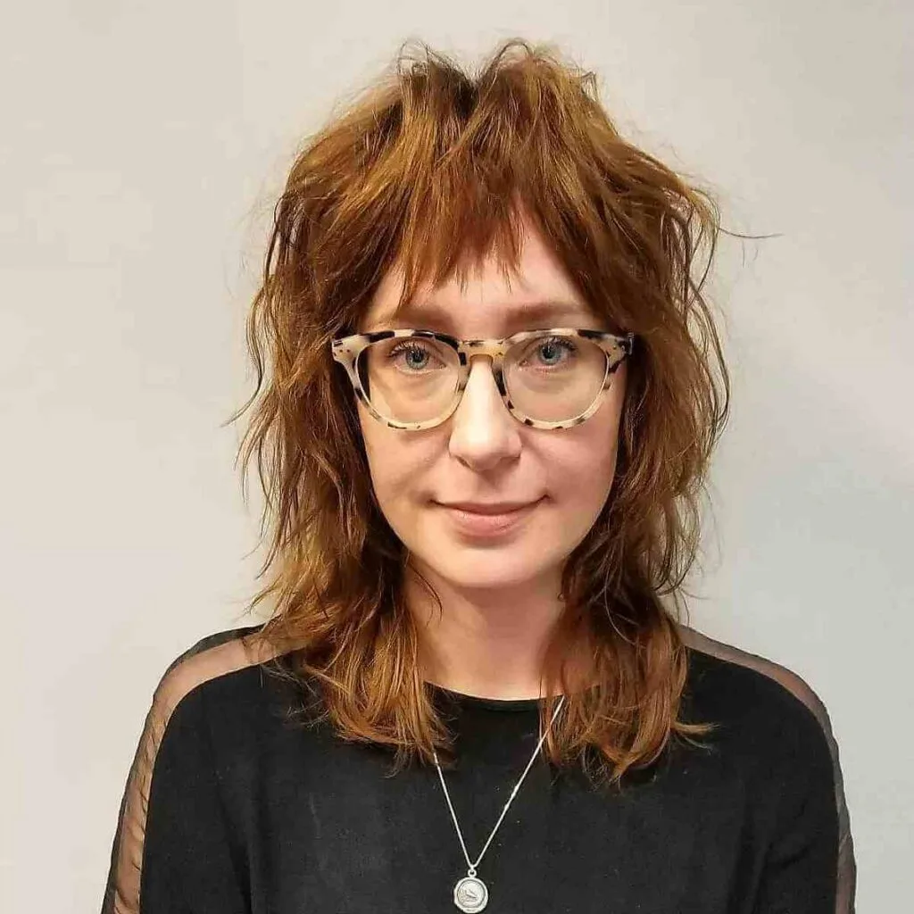 Chic Messy Shag with Layered Bangs for Fine Haired Women Past 40