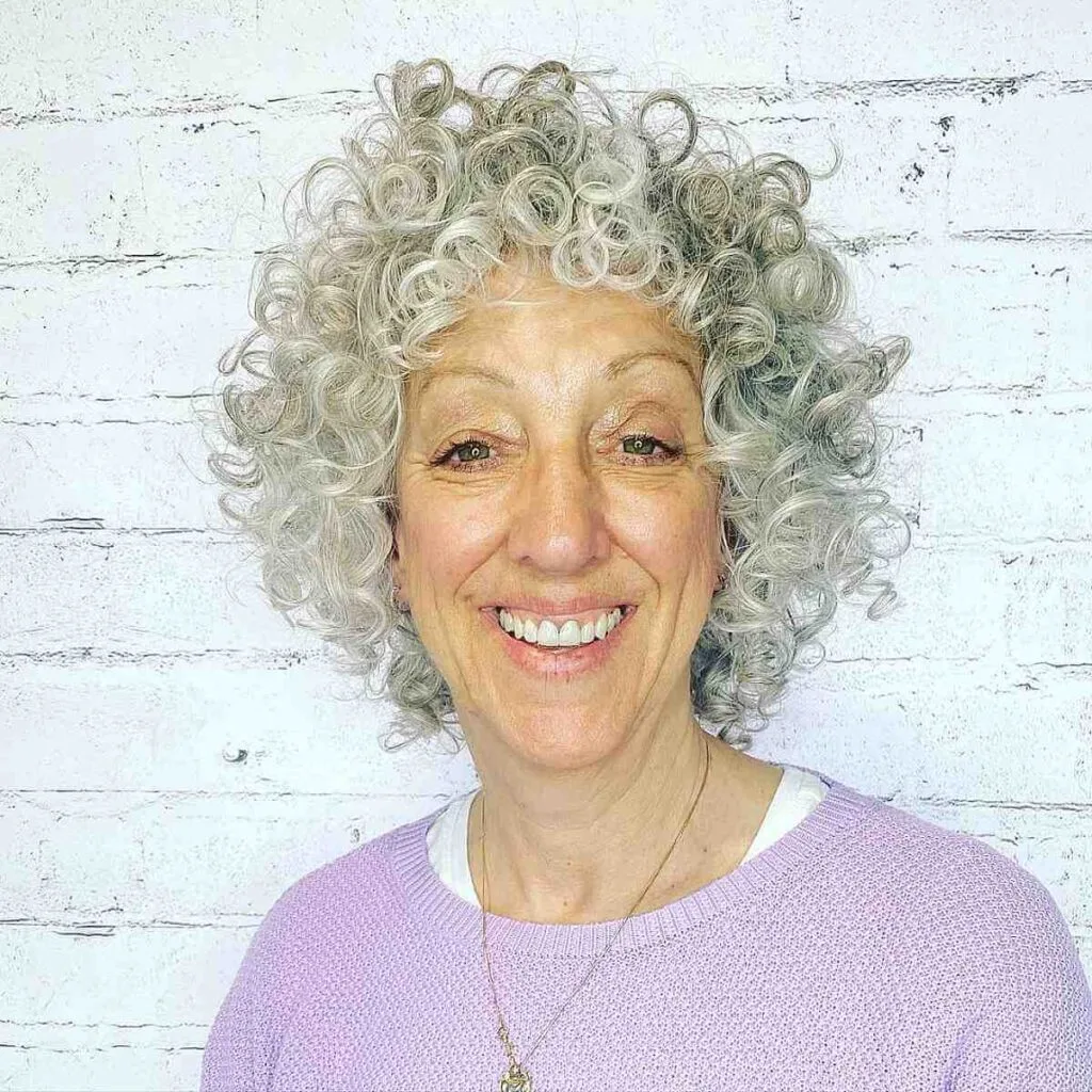 Chic Neck-Length Cut with Defined Curls for Women Over 60