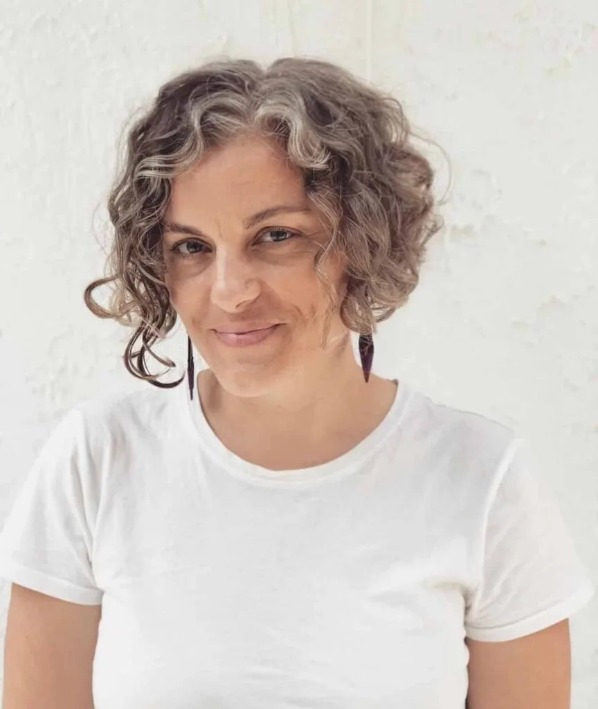 chin-length curly pixie for delicate hair over 60