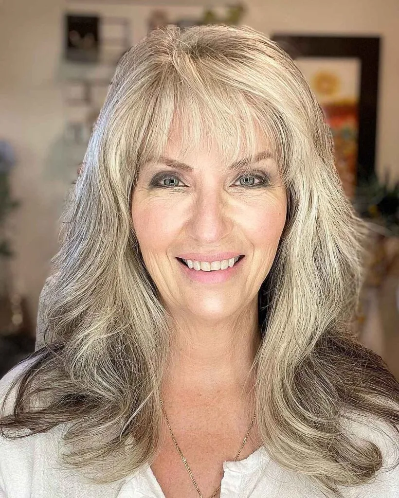 Collarbone-Length Hair with Light Bangs for women over sixty