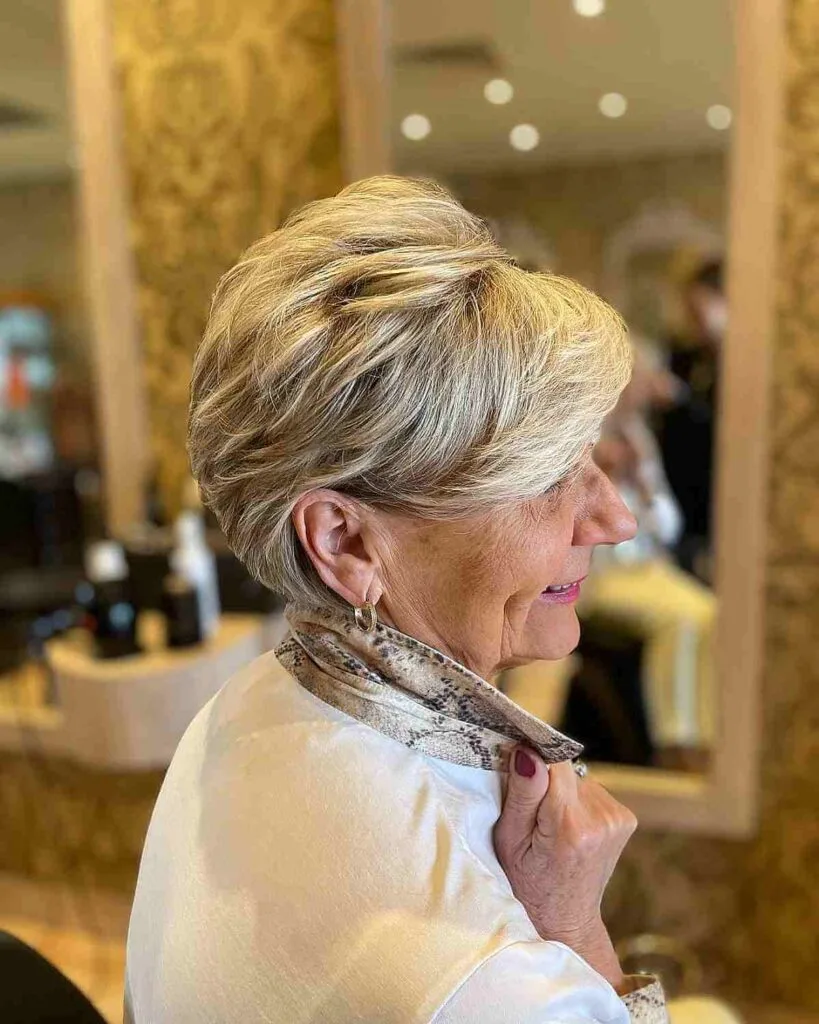 Elegant Short Long Blonde Pixie with Layered Texture for Women in Their 60s