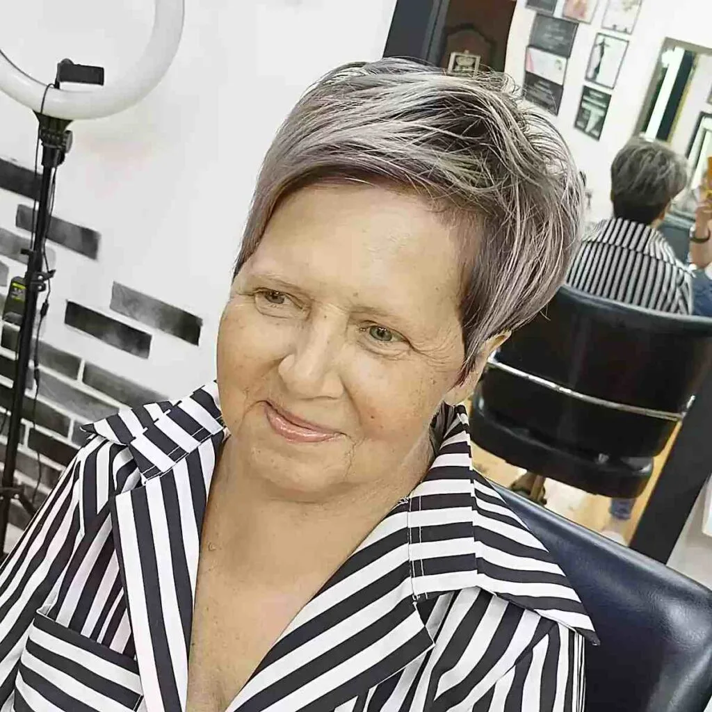 Elegant Silver Side-Swept Pixie for an Older Woman with Glasses