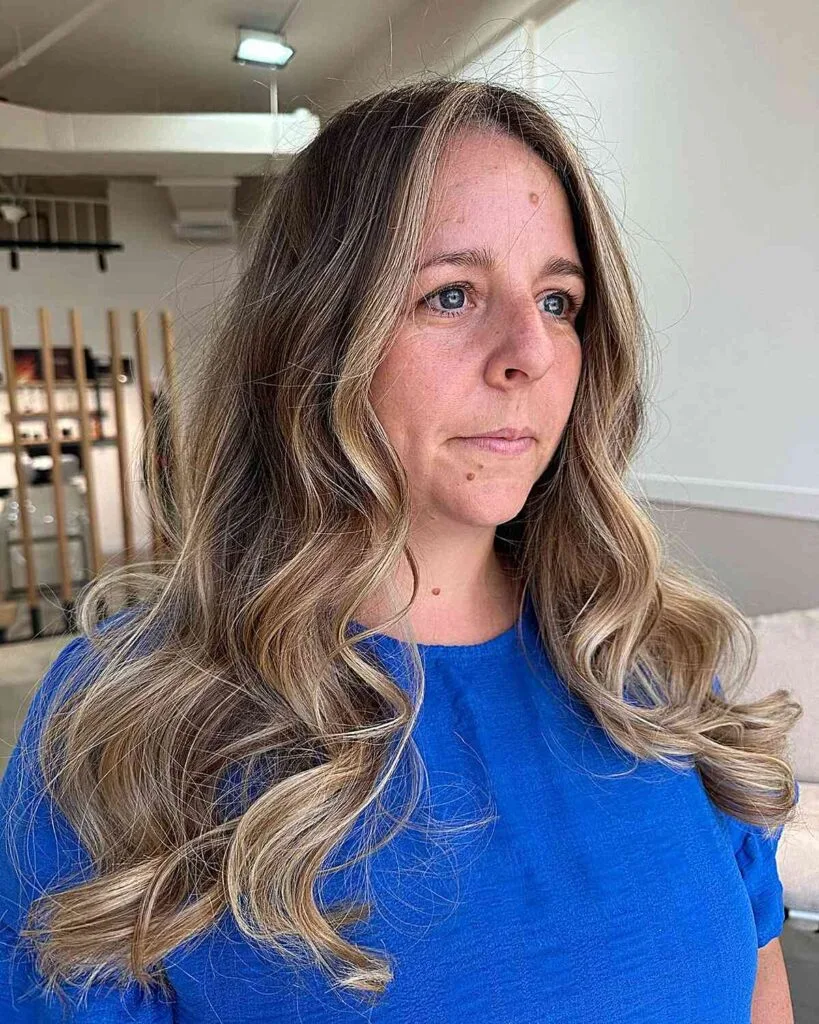 Long Wavy Brown Hair Featuring a Money Piece for Overweight Mature Women Over 50
