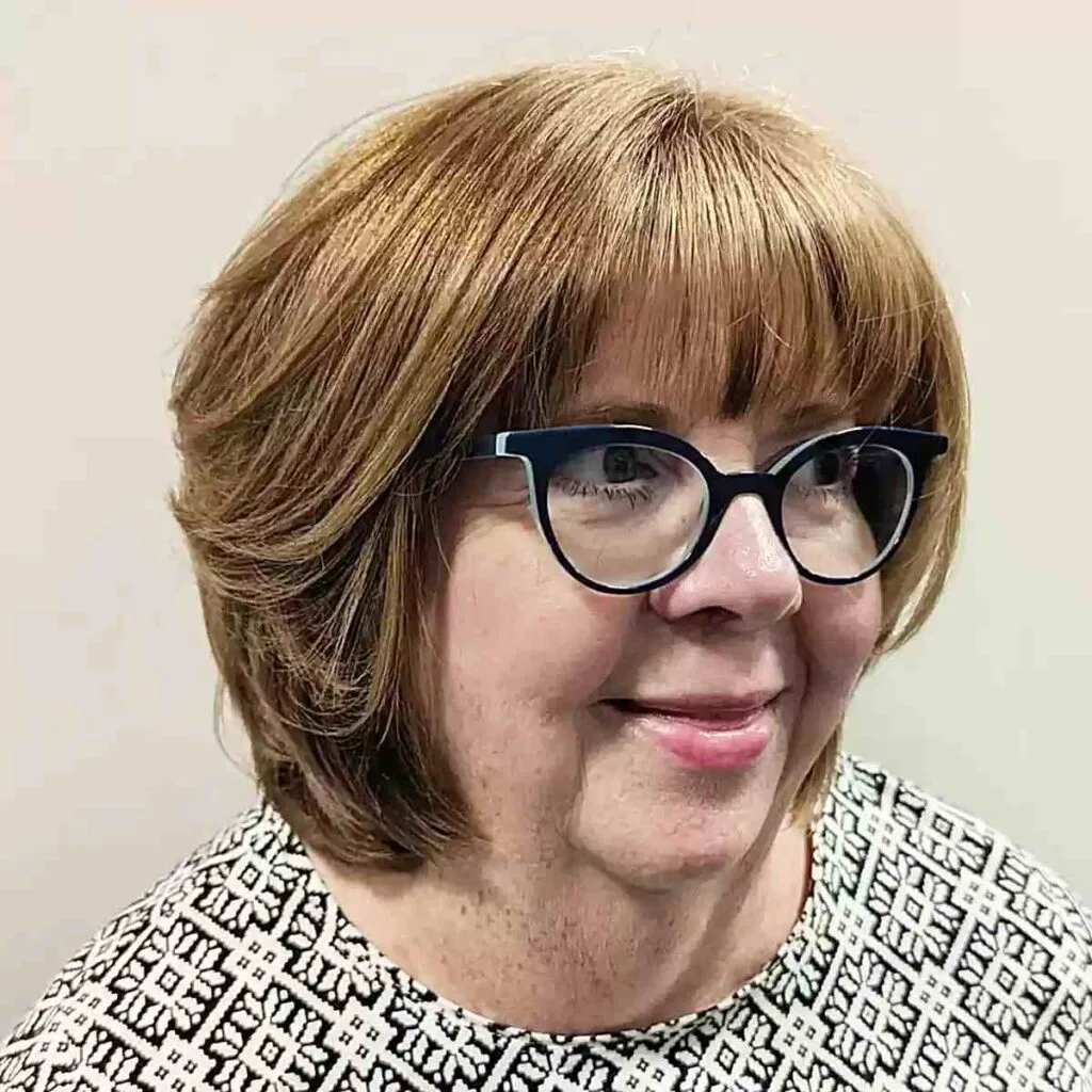 Neck-Length Curved Bob with Light Bangs for Plus Size Women Over Fifty with Glasses