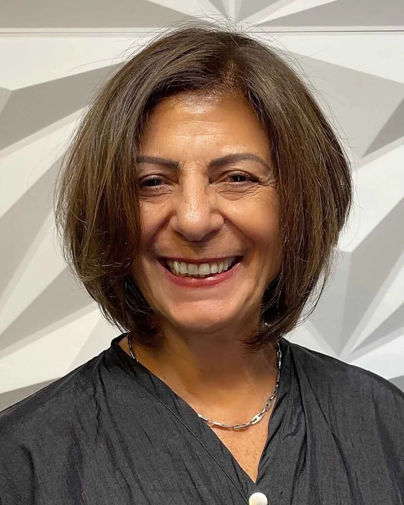 Side-Part Neck-Length Hairstyle for a woman over sixty