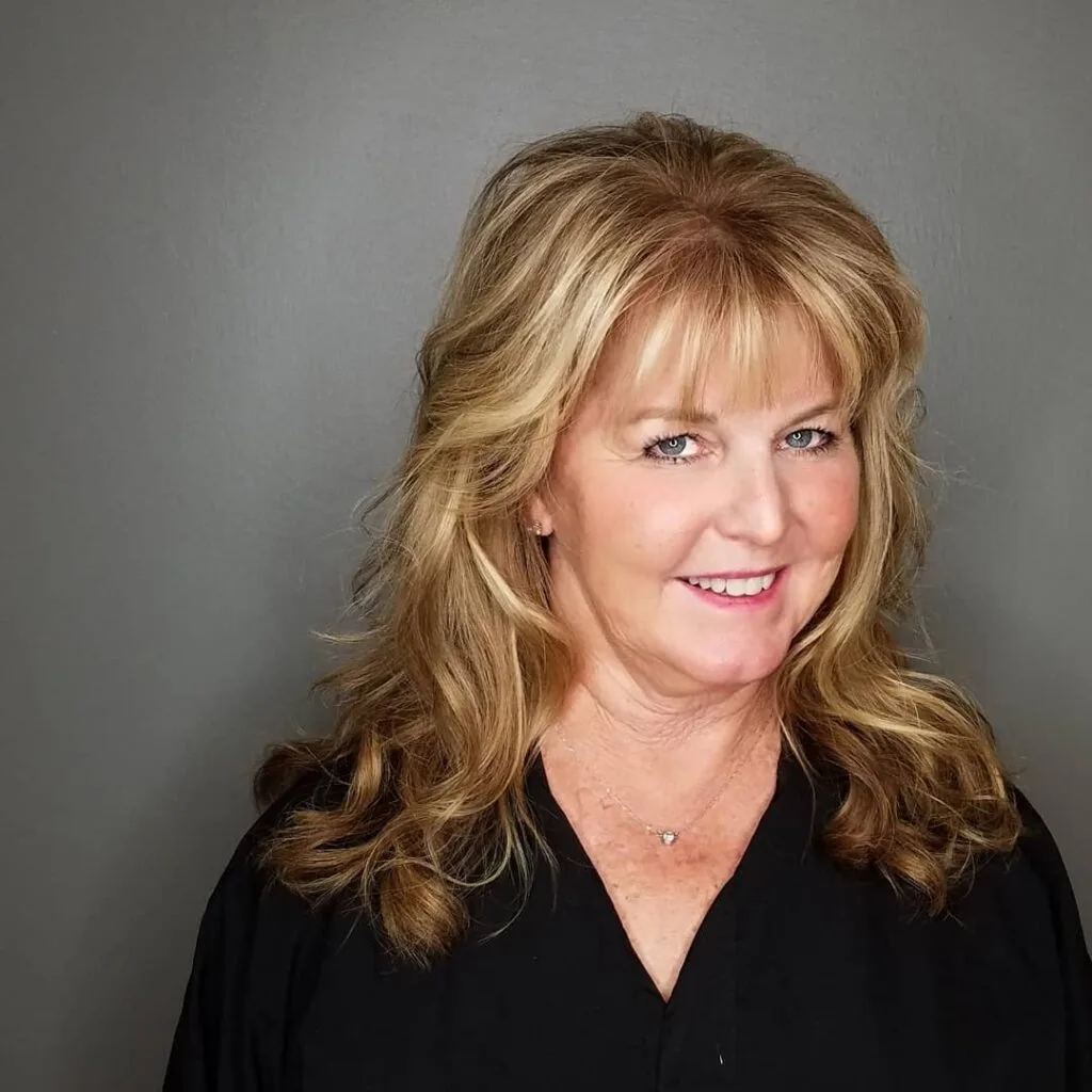 Soft Layered Waves with Face-Framing Bangs