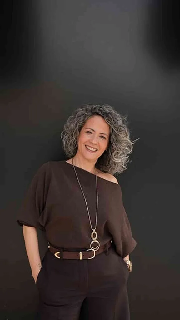 Stylish Curly Haircut for Gray Hair Over 50