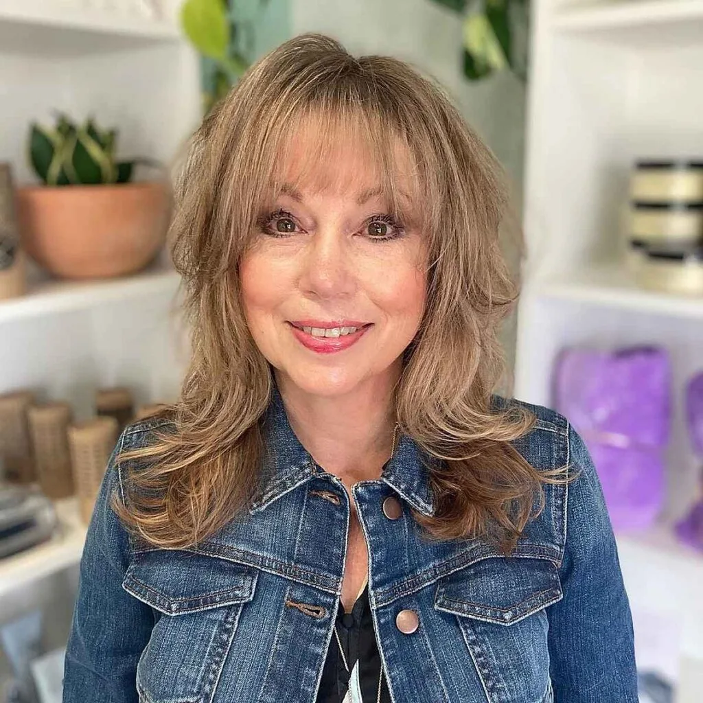 Textured Shaggy Cut with Fringe for Long Hair for women over sixty years old