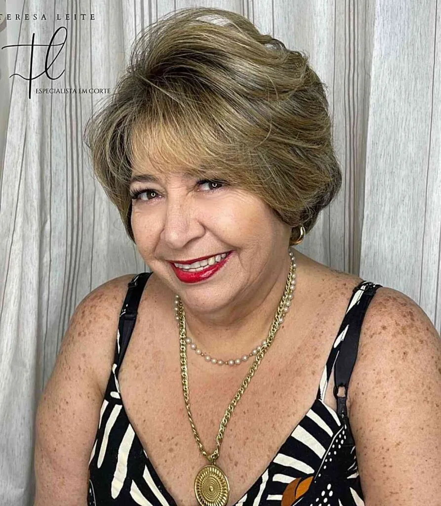Voluminous Short Bob with Delicate Bangs for Mature Women with Fuller Faces