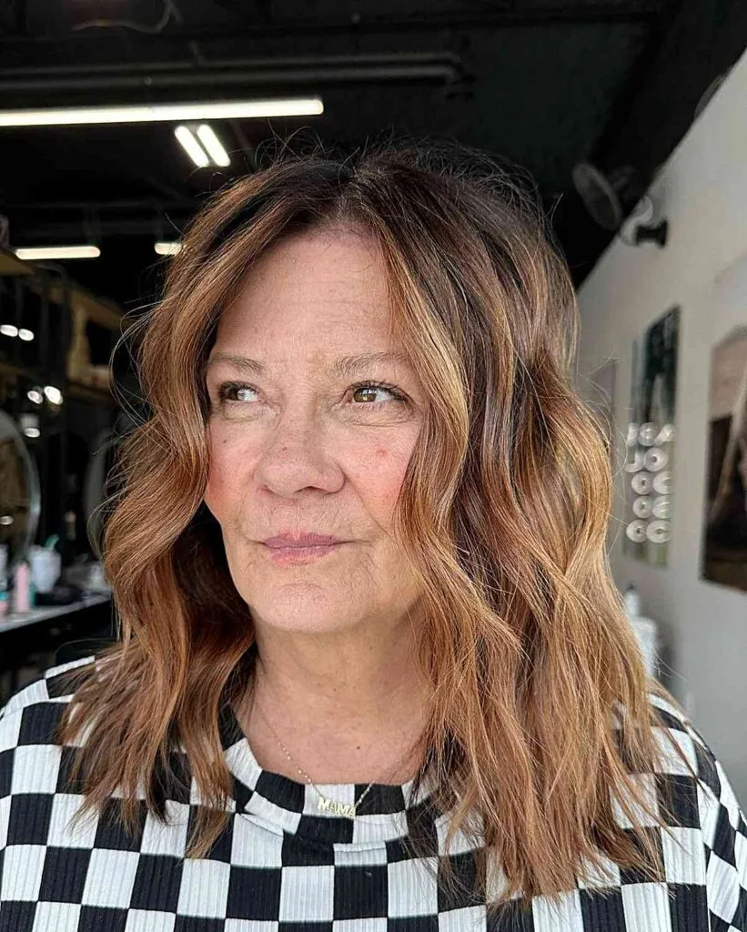 Autumn Cinnamon Brown Shades and Mid-Length Beach Waves for Women Aged 50