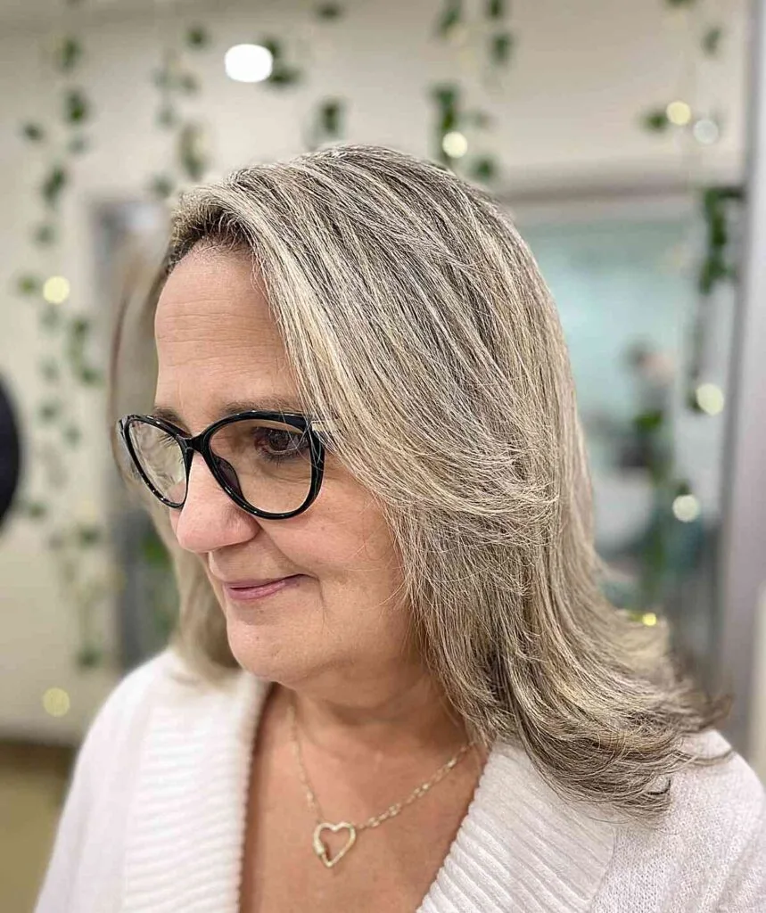 Babylights on a Mid-Length Hairstyle for Women Aged 60 with Glasses