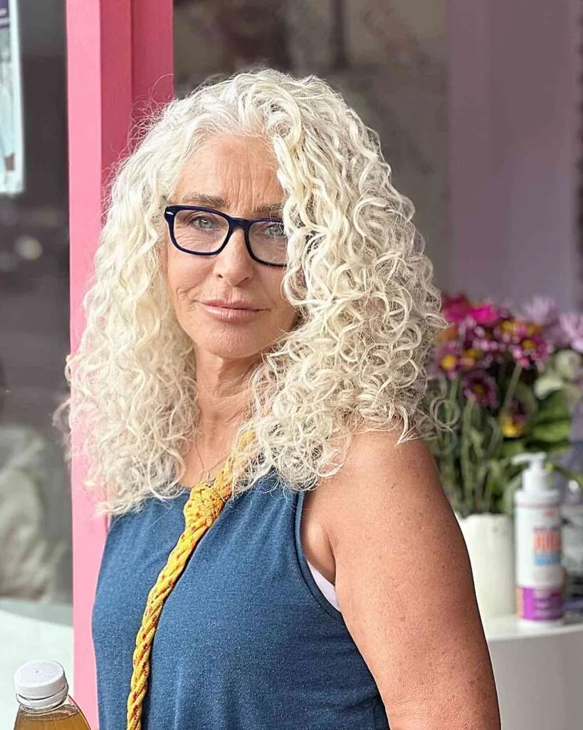 Barbie-Inspired Loose Curls for Long Blonde Hair suitable for 60-year-olds with Specs