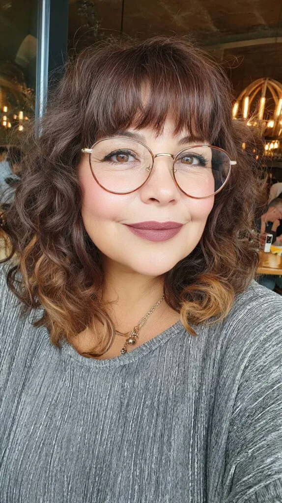 Chic Curly Mid-Length Cut with Blunt Bangs