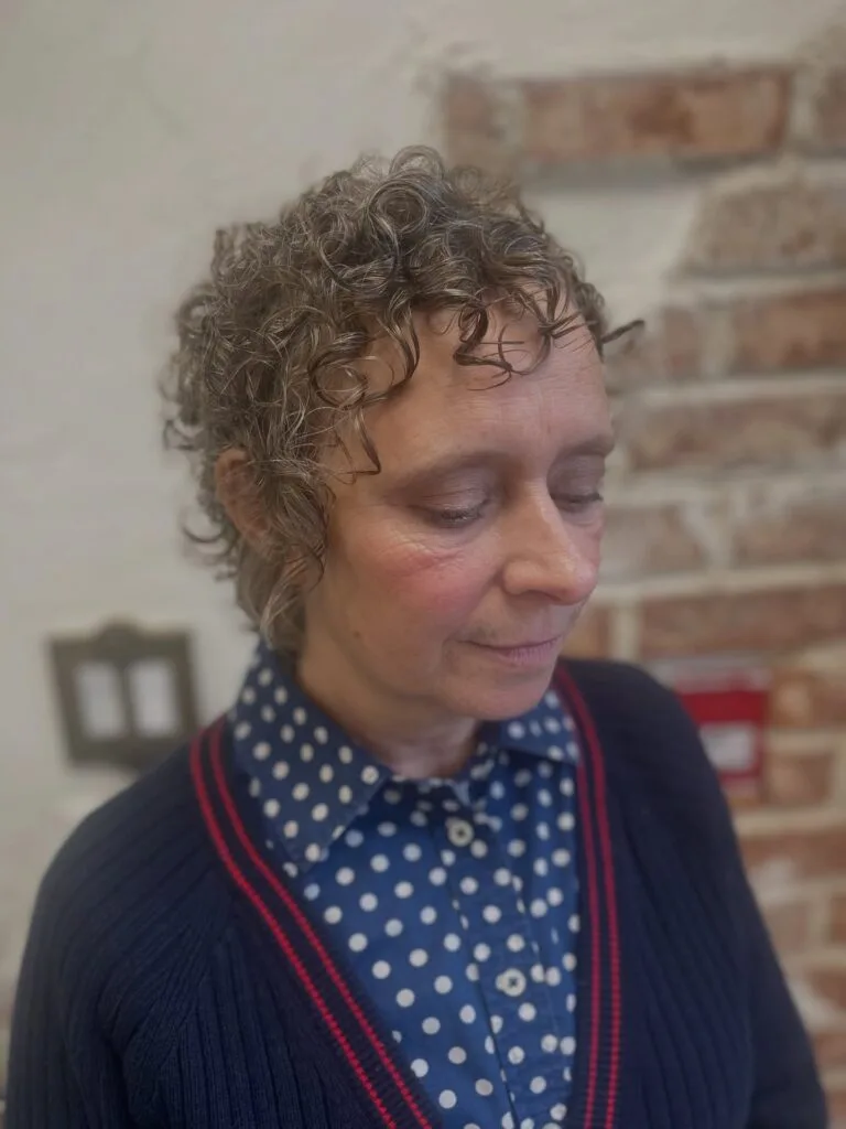 Chic Curly Pixie Cut with Soft Layers
