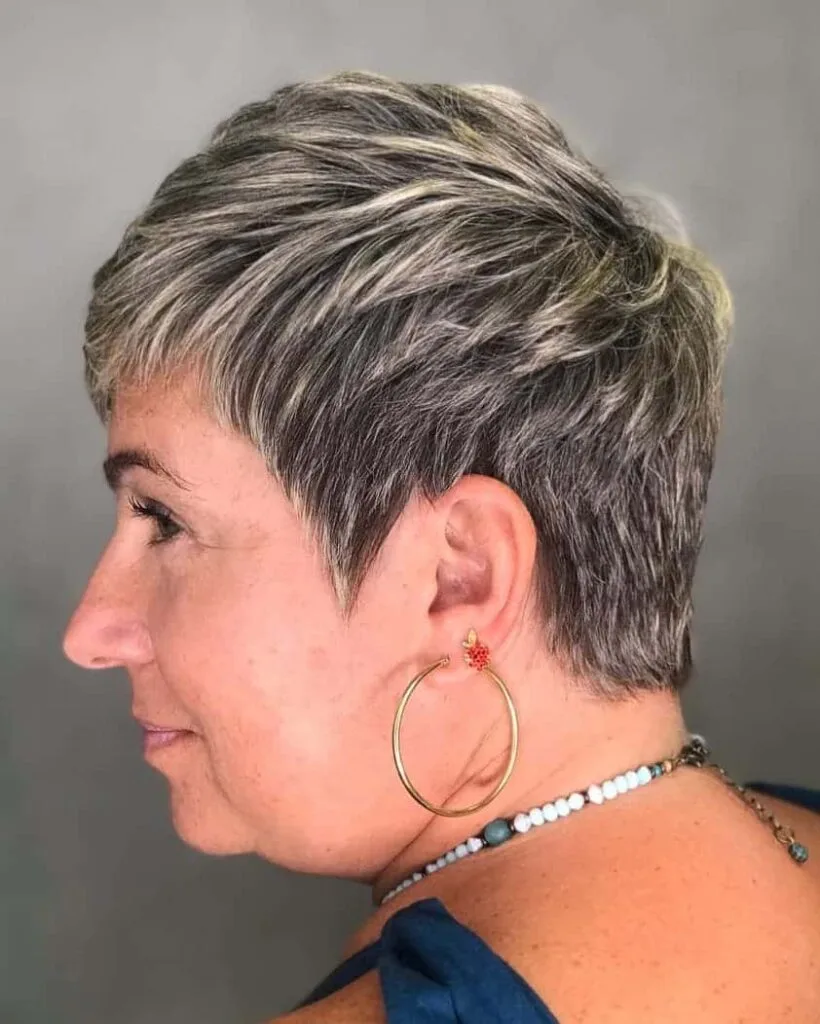 chic grey pixie with undercut for women in their 50s featuring thick hair