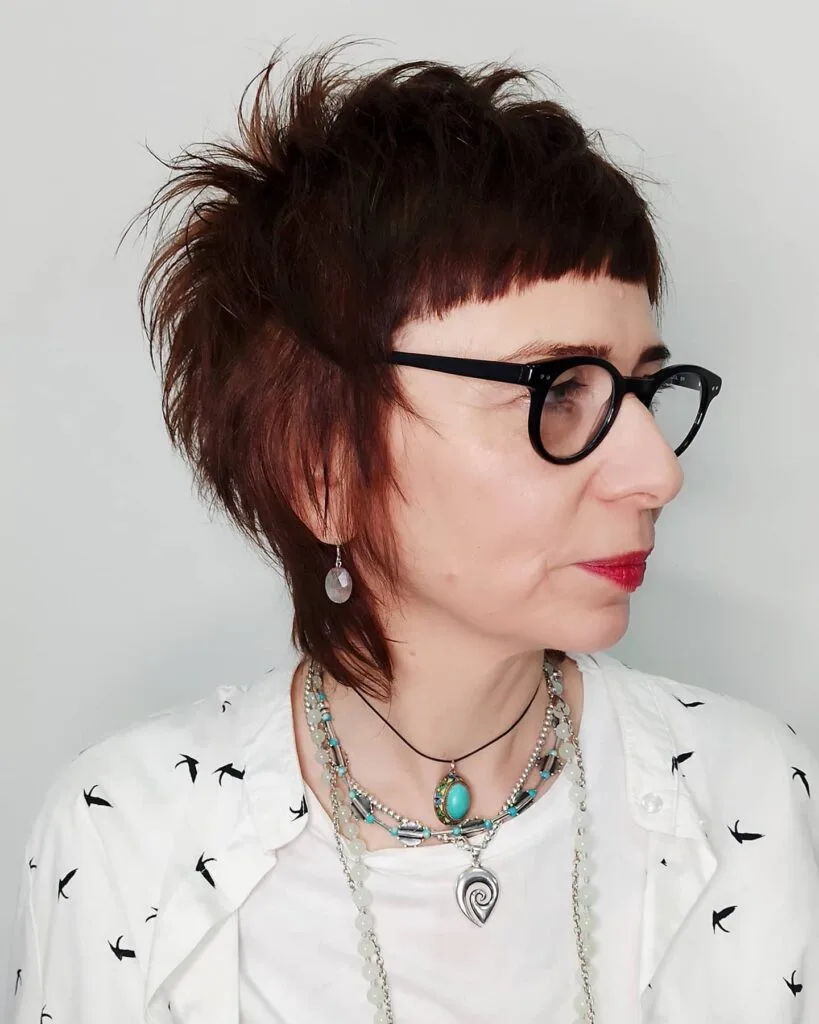 Edgy Textured Pixie Cut with Bold Fringe