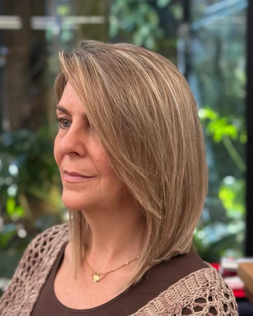 Gracefully Layered Side Bangs with Subtle Highlights