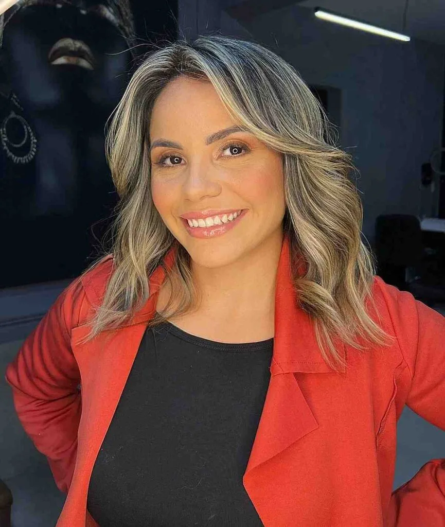 Medium-Length Blonde Balayage with Center Parting for 40-Year-Olds