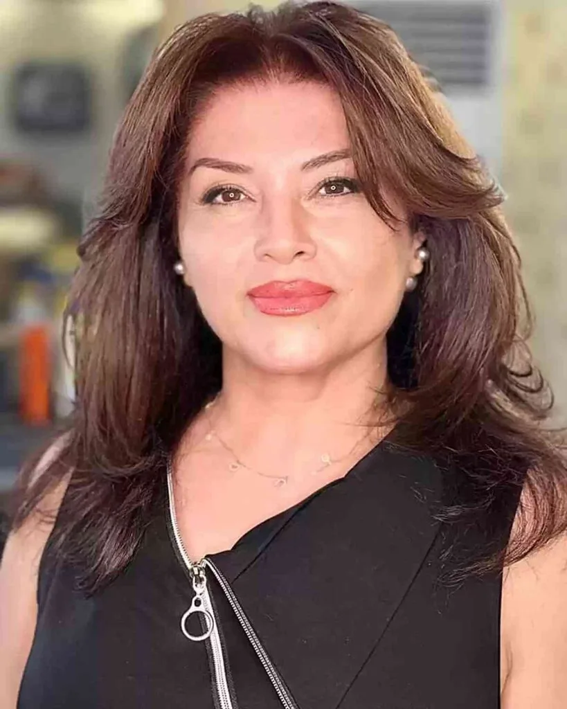 Medium-Length Sleek Brunette Straight Hairstyle for 40-Year-Olds