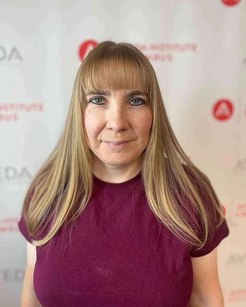Medium-Long Hair with Rounded Bangs on ladies over 50
