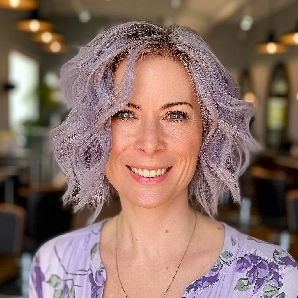 Shaggy choppy wavy bob with lavender color and beachy texture