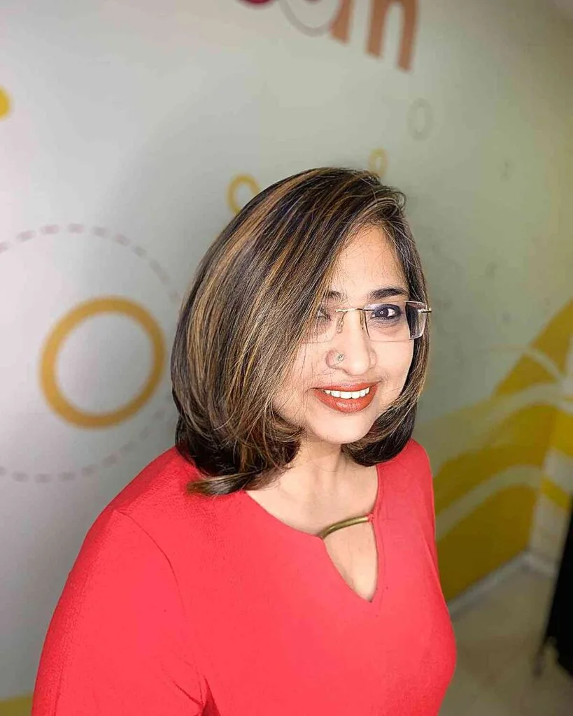 Side-Swept Medium Dark Tresses with Highlights for Women Over 50