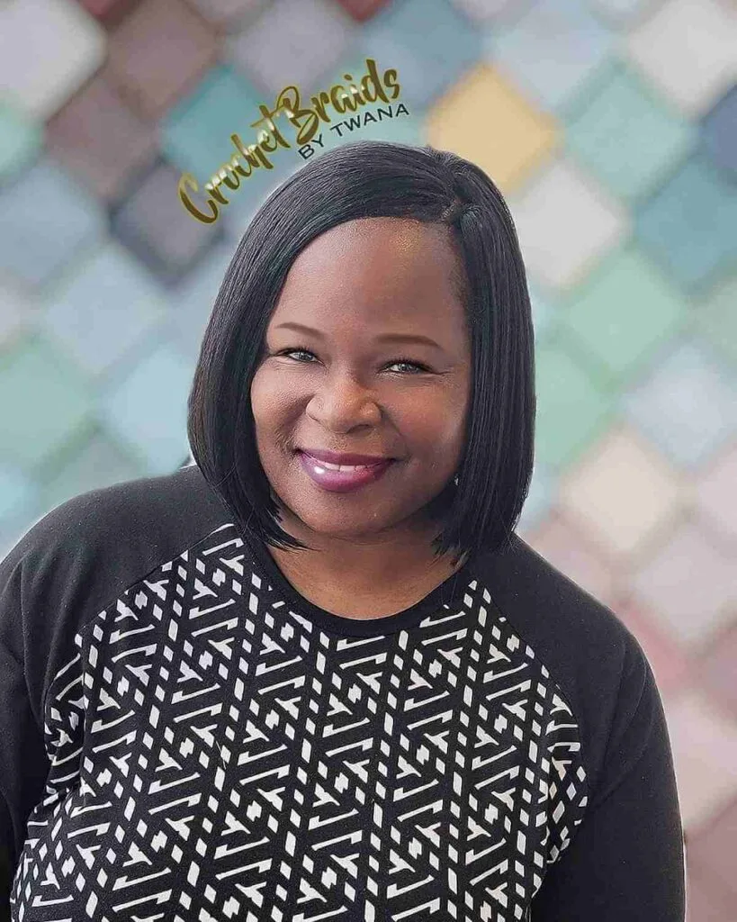 Sleek Bob Hairstyle for a Black Woman Over 40 Years of Age