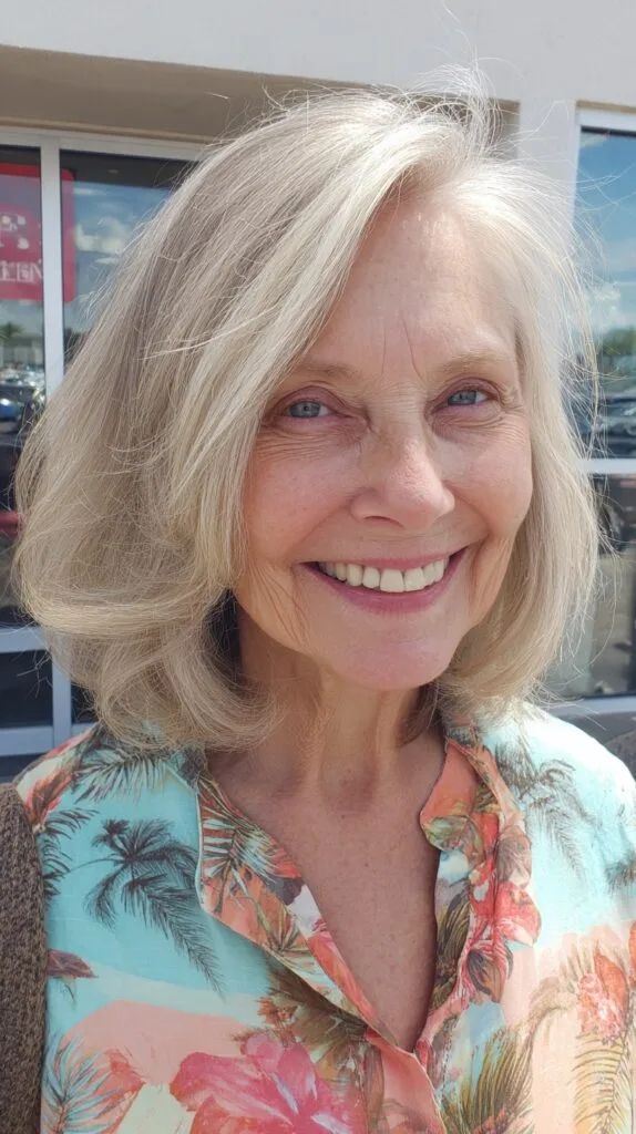 Soft Silver Shoulder-Skimming Layered Lob with Side-Swept Bevel