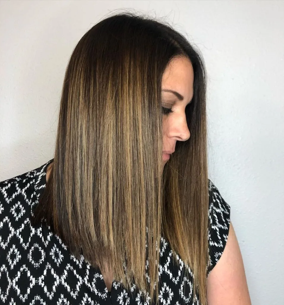 straight long bob for women over 50 years old with thick hair